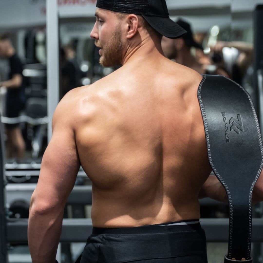 6 inch weightlifting belt worn in the gym to provide lumbar and core stability