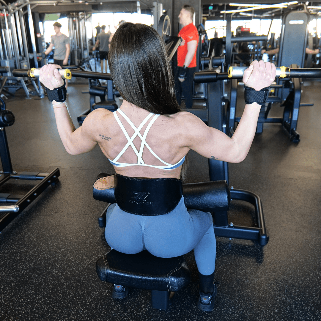 leather weightlifting belt fitted around the waist for secure strength training support