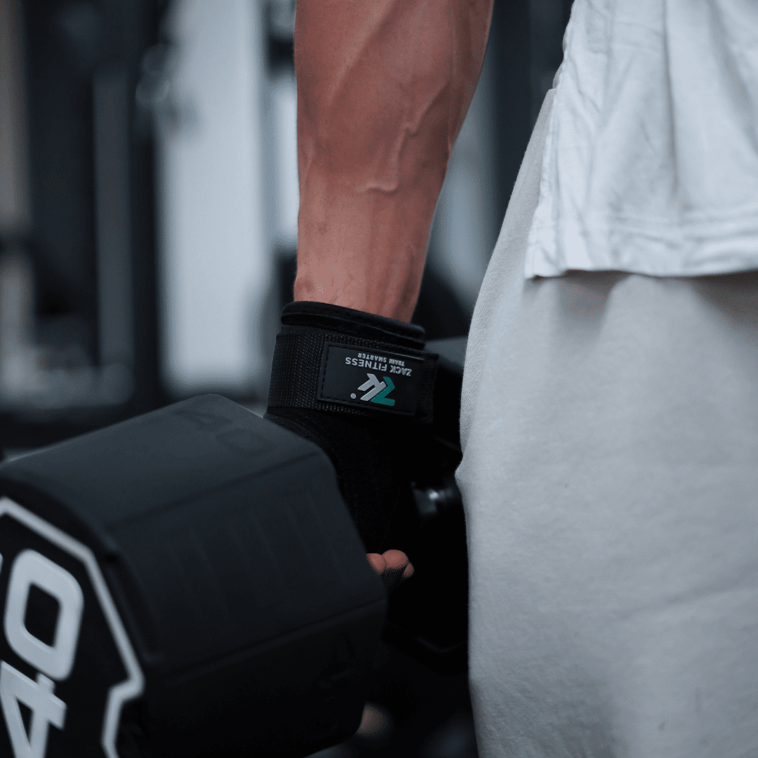 Wrist straps wrapped around pull up bar to support grip and reduce forearm fatigue during upper body workouts