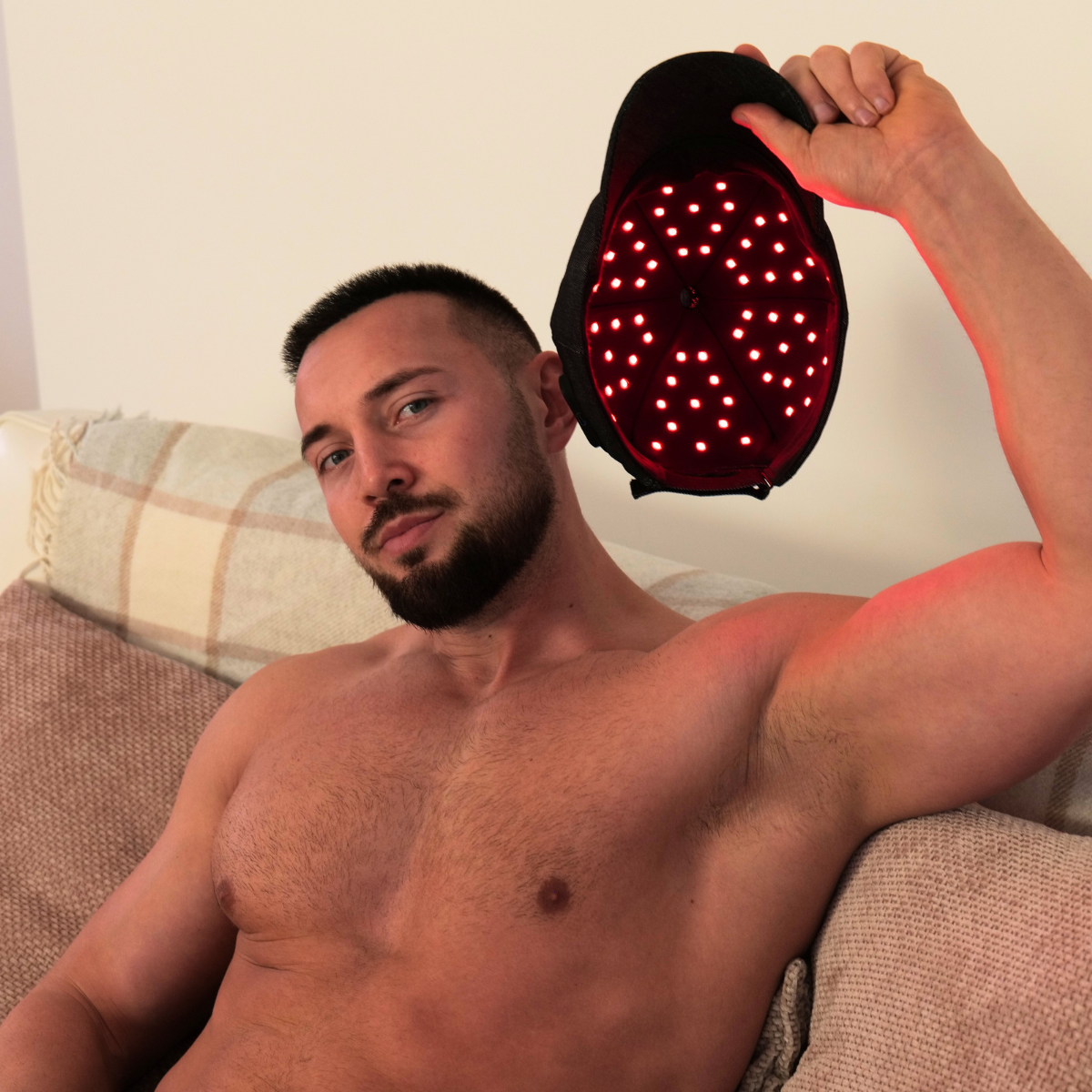 Lifestyle image showing red light therapy cap during daily self-care routine