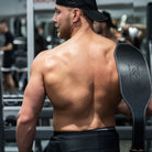 6 inch weightlifting belt worn in the gym to provide lumbar and core stability