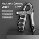 Grey adjustable hand grip strengthener with counting function positioned upright.