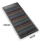 Folded PEMF therapy mat showing thickness and stitched edge detail.