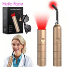 Handheld red light therapy wand with angled tip for facial and oral wellness use