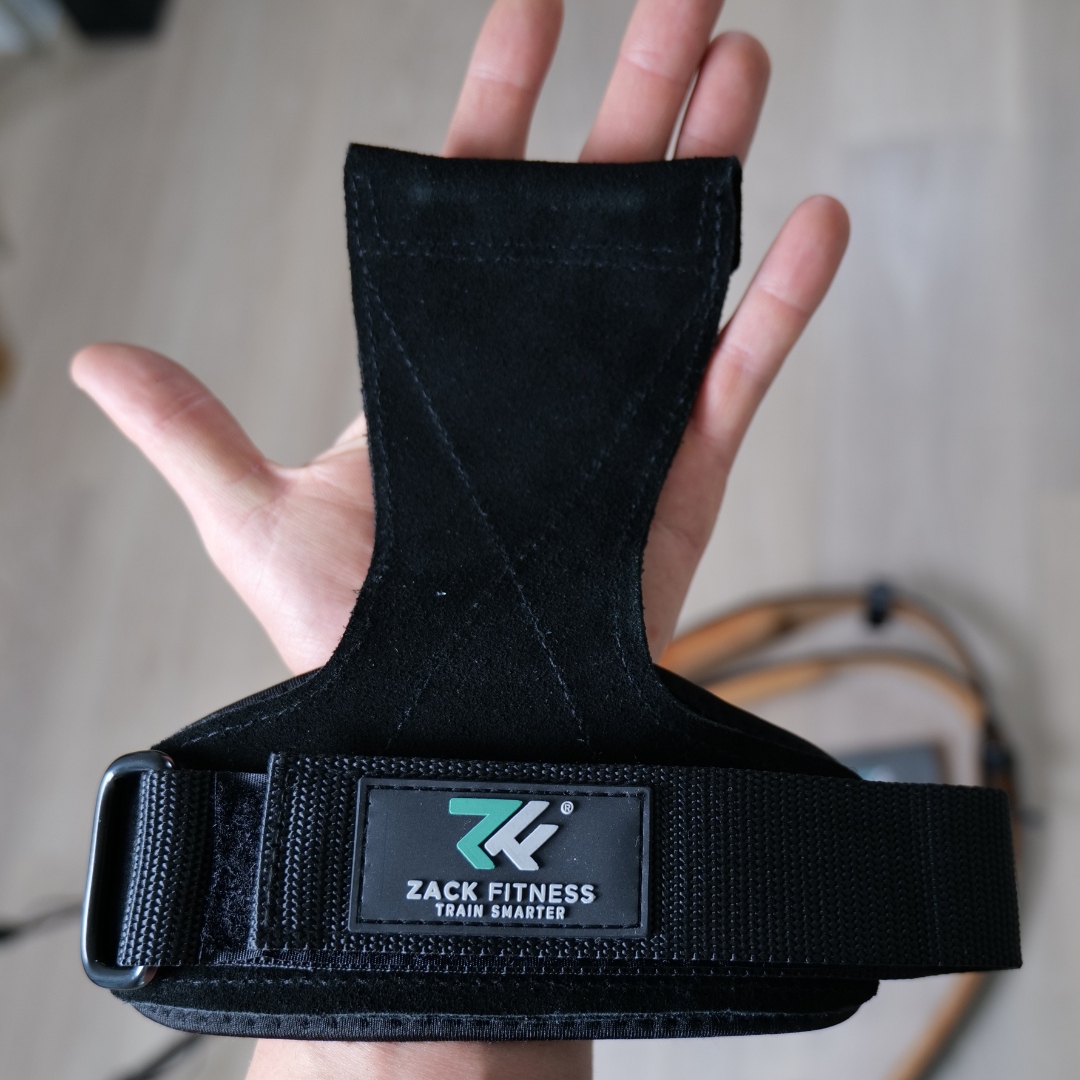 Wrist straps improving grip security on barbells and dumbbells during heavy strength training