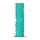 Green foam roller for yoga stretching and mobility exercises

