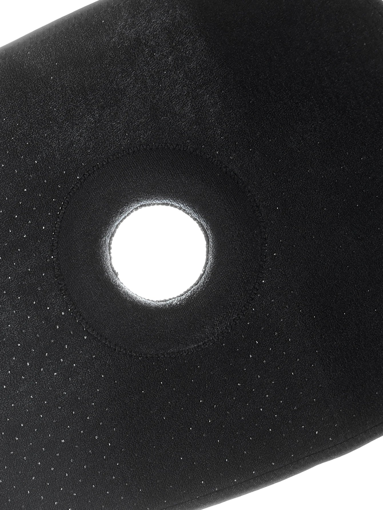 sports knee brace providing patella support during running workout