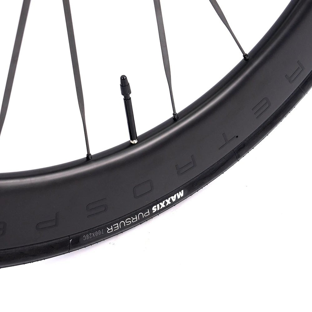 Integrated carbon handlebar and stem on professional carbon road racing bike with internal cable routing