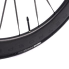 Integrated carbon handlebar and stem on professional carbon road racing bike with internal cable routing