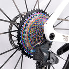 Wireless rear derailleur detail on carbon fiber road racing bike with 13 speed system