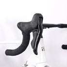 Hydraulic disc brake lever detail on carbon road bike with wireless shifting system