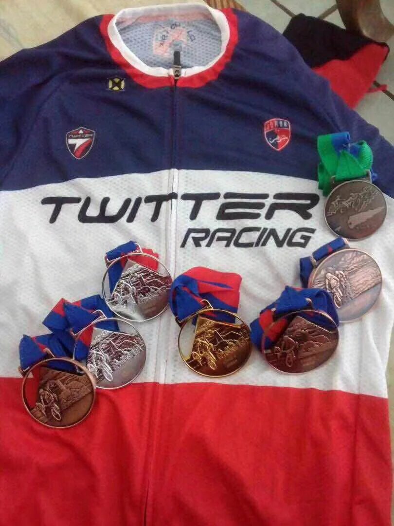 Front hydraulic disc brake on carbon road bike with 160mm rotor and thru axle