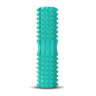 Green foam roller for yoga stretching and mobility exercises
